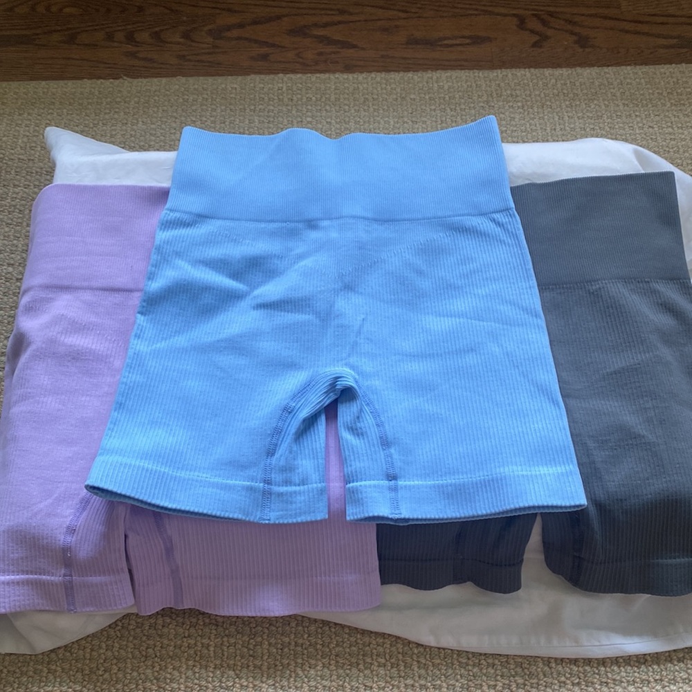Dark grey biker shorts, light blue biker shorts, lavender biker shorts